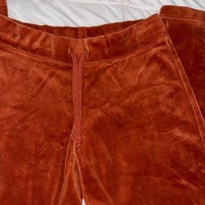 Orange velvet fitting sweat pants